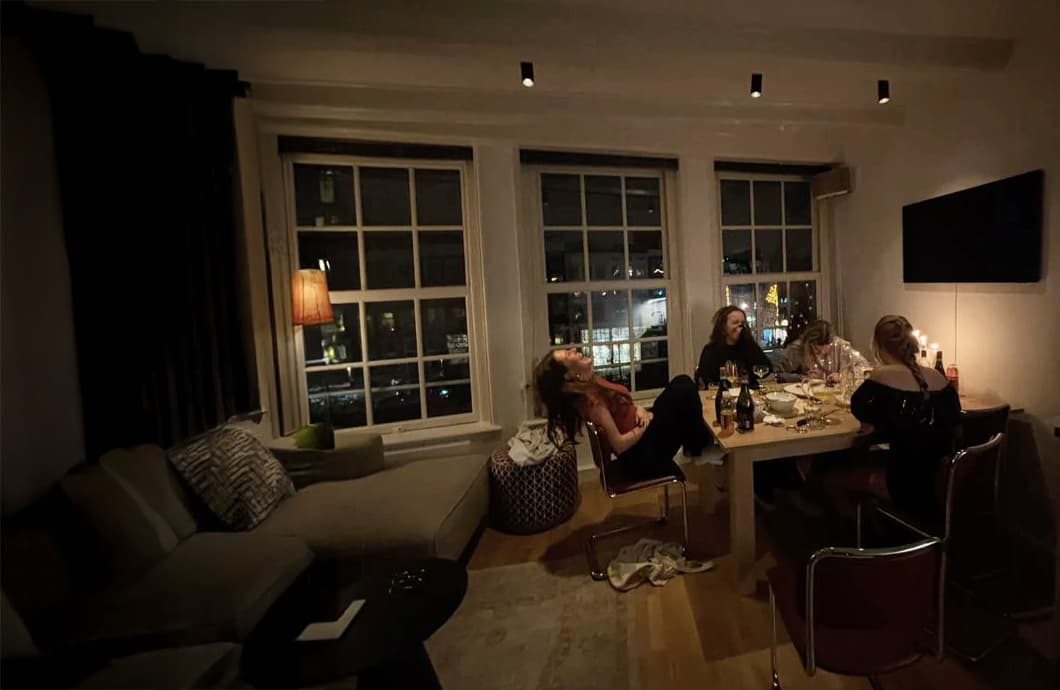 A club around the table, late, still talking